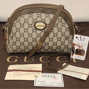 GUCCI/GUCCI PLUS VINTAGE '70'S HALF MOON CROSS BODY W/ORIG GUCCI GUARANTEE CARDS